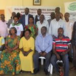 Group-photo-after-a-dialogue-between-Hoima-sugar-limited-and-Kigyayo-communities
