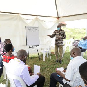 Dr. Adolf Mbaine training AJOP members