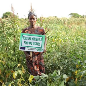 Judith of Ngwedo women's group in a mother garden of vegetables, Bulisa ditrict