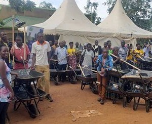 NAPE supported community partner farmers with farming tools including wheel barrows and hoes to boost their household food and incomes.