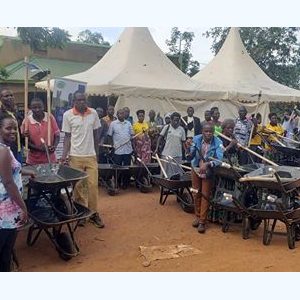 NAPE supported community partner farmers with farming tools including wheel barrows and hoes to boost their household food and incomes.